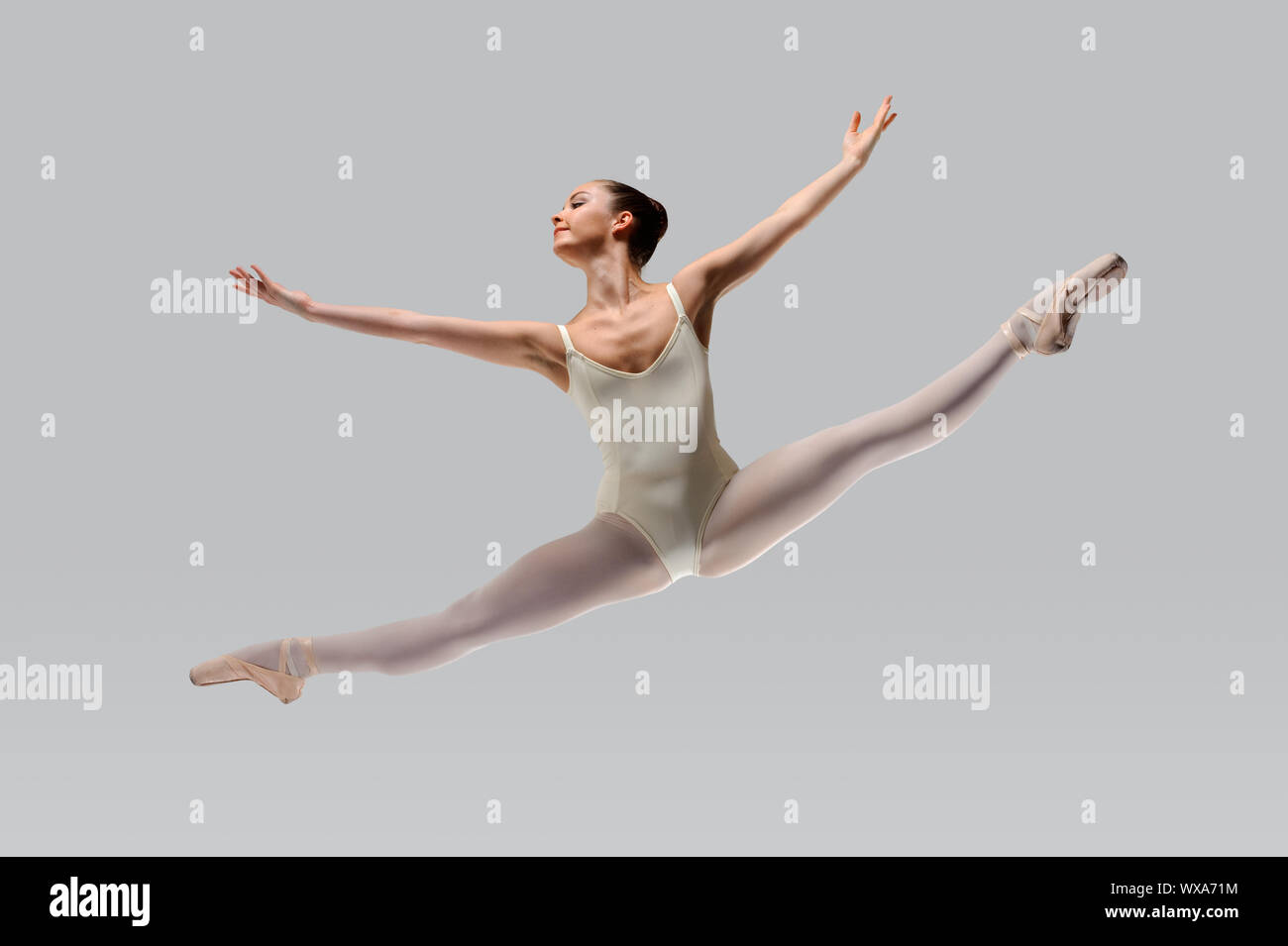 Girl in leotard performing the splits hi-res stock photography and ...