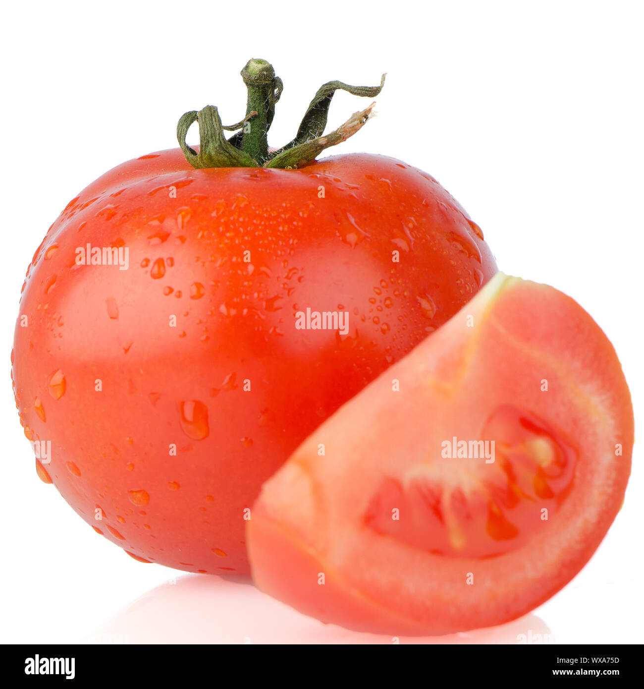 Red tomatos isolated on white background Stock Photo - Alamy
