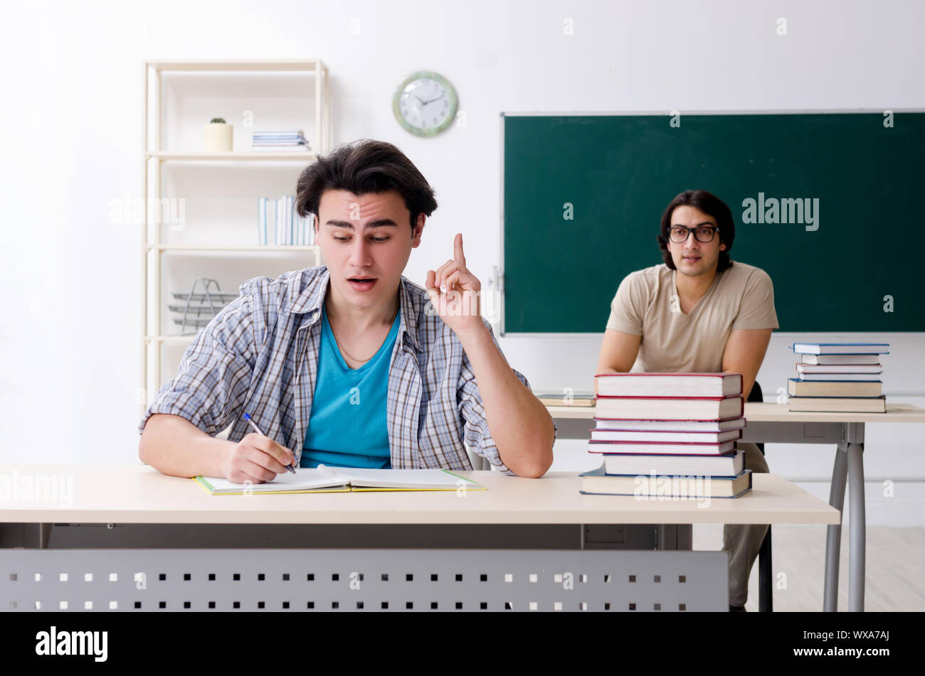 Two male students in the classroom Stock Photo
