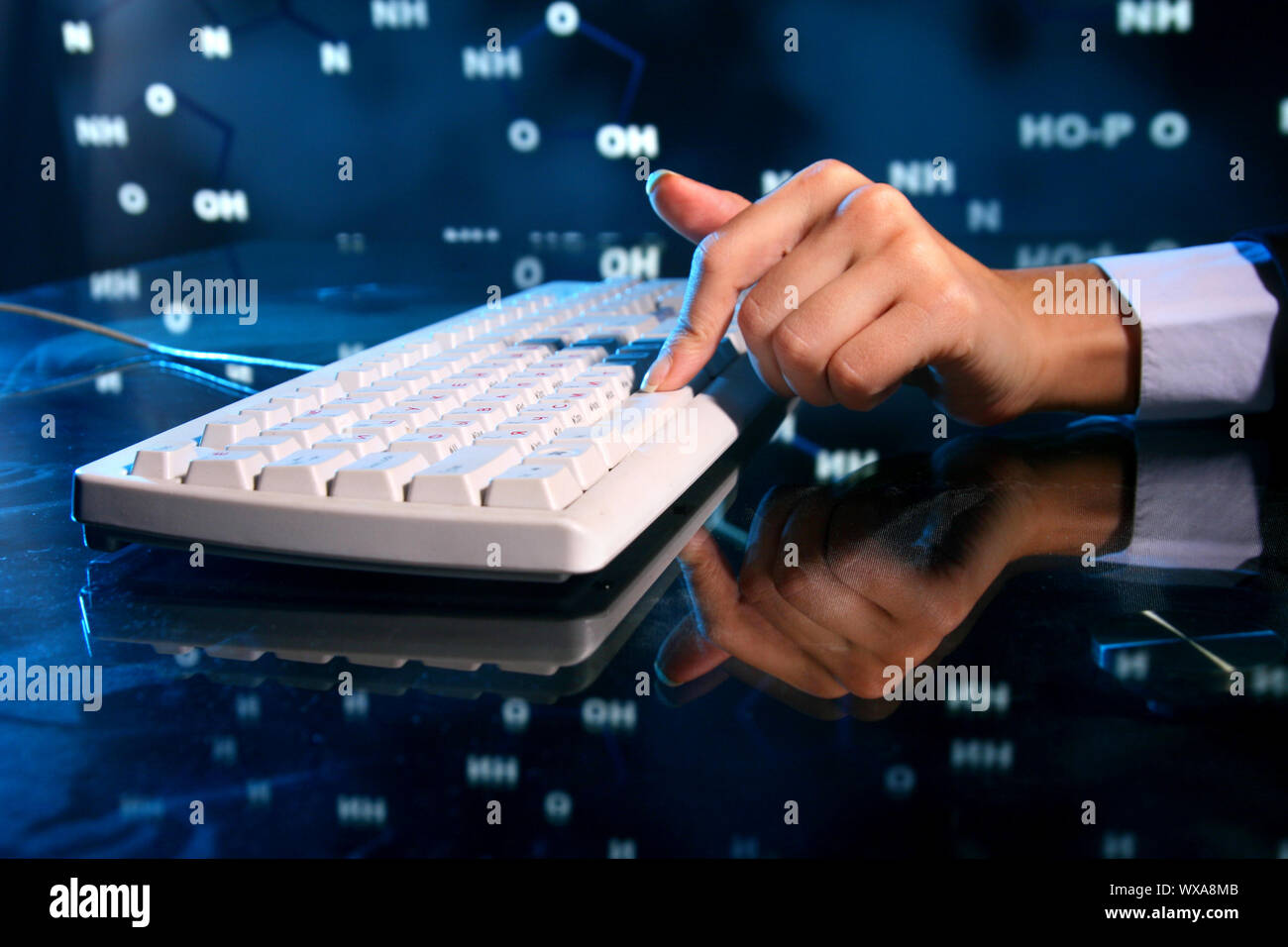 dna information of genom typing on keyboard Stock Photo - Alamy