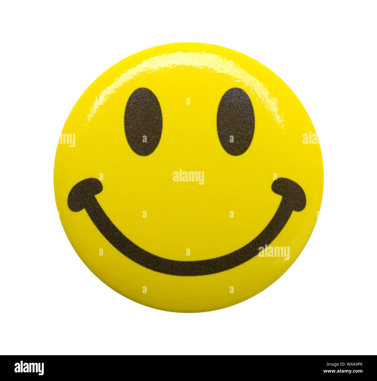 Yellow Happy Face Emoji Button Isolated on White. Stock Photo