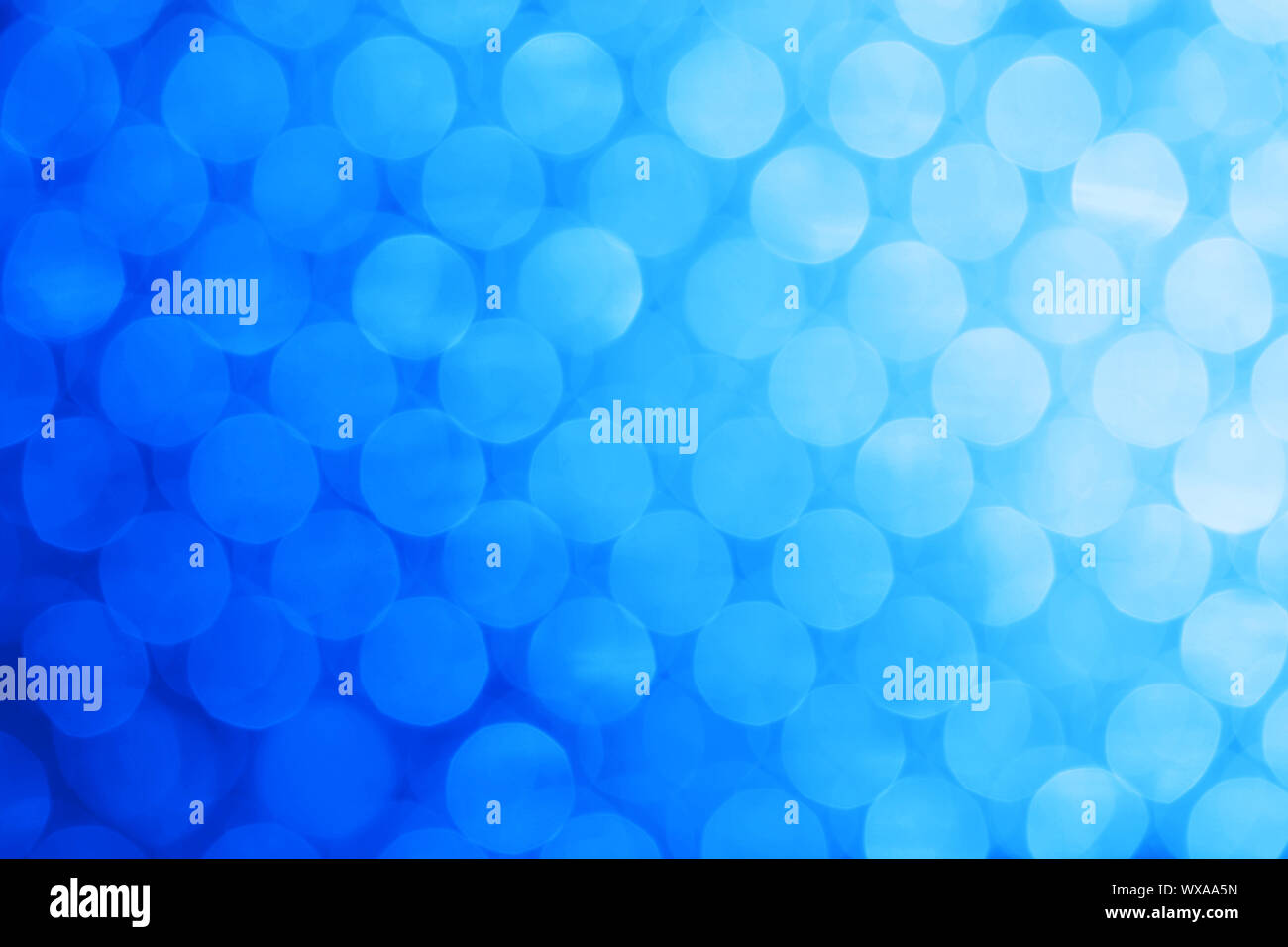 Bright holiday background bokeh with magic blur blue lights Stock Photo ...