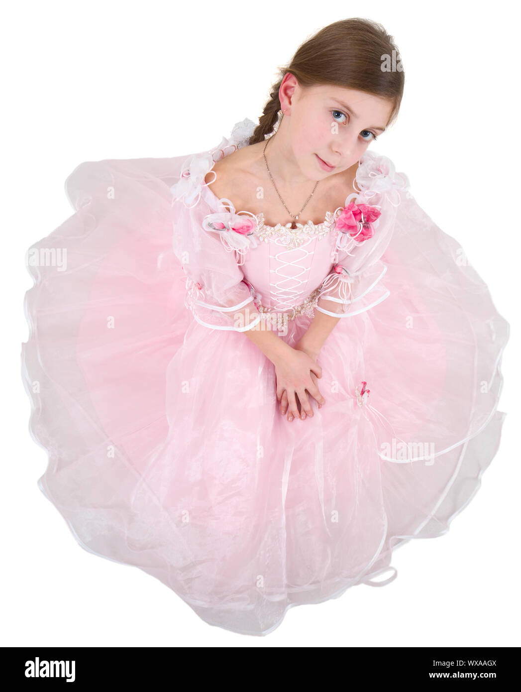 Girl in pinkish dress on a white background Stock Photo - Alamy