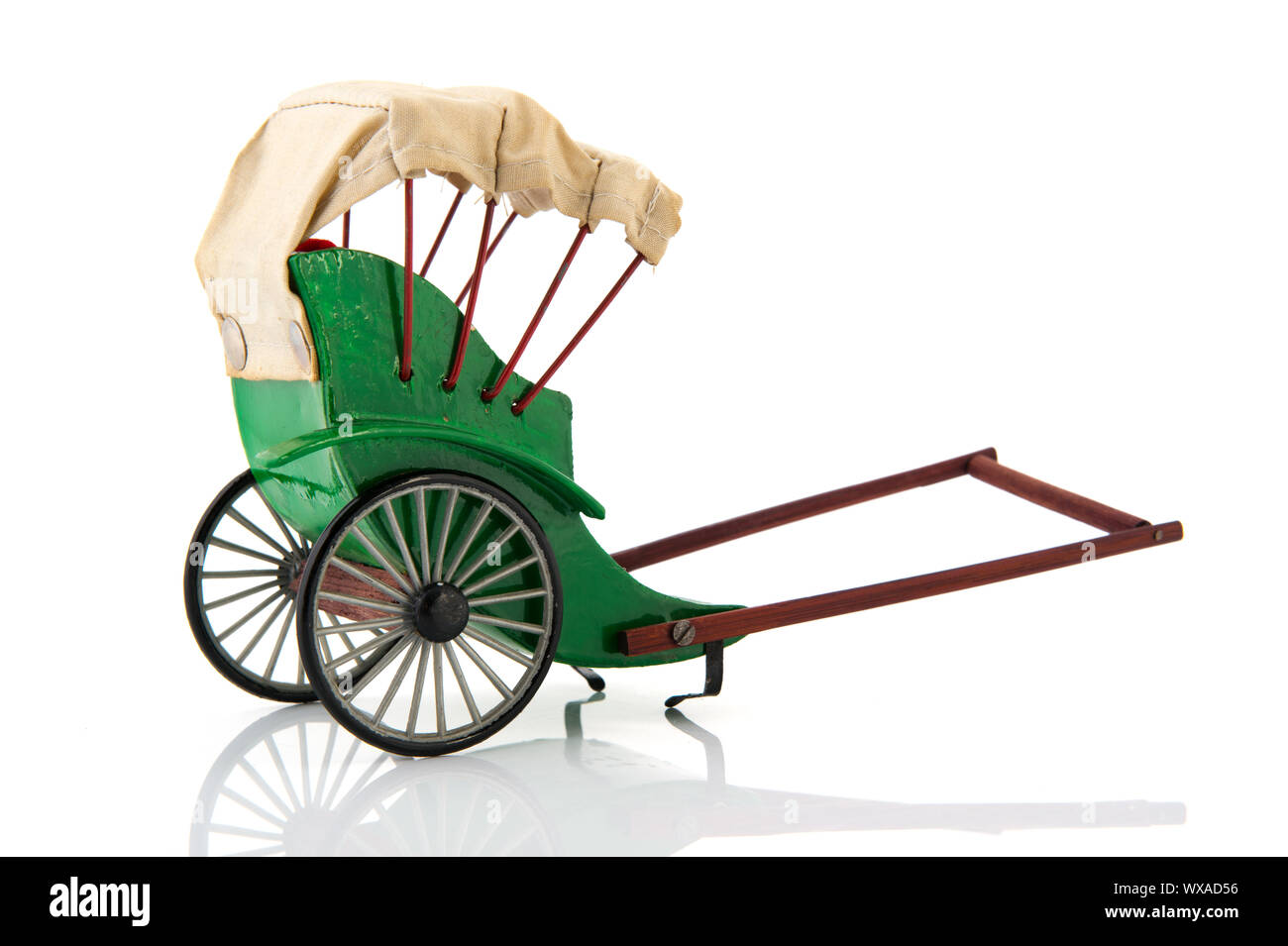 Green empty Pulled rickshaw isolated over white background Stock Photo ...