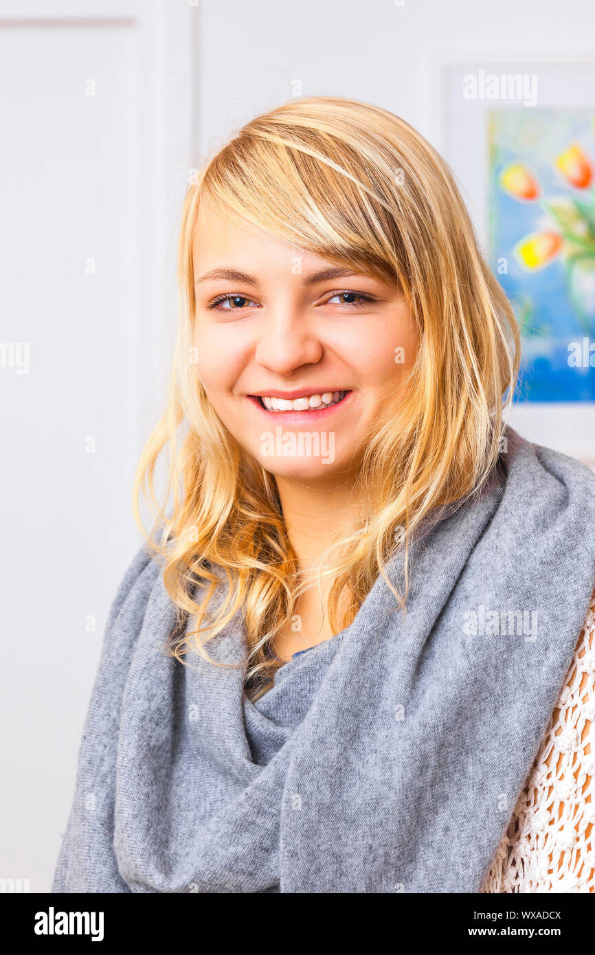 An image of a beautiful smiling blond girl Stock Photo - Alamy