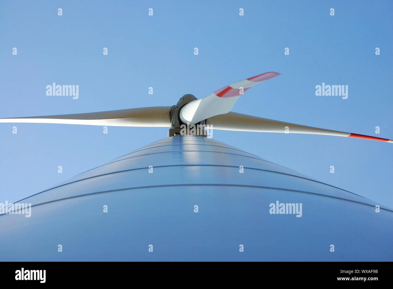 wind turbine under blue sky for alternative energy Stock Photo - Alamy