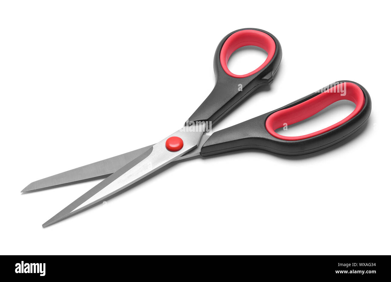 Red and Black Fabric Scissors Isolated on White. Stock Photo