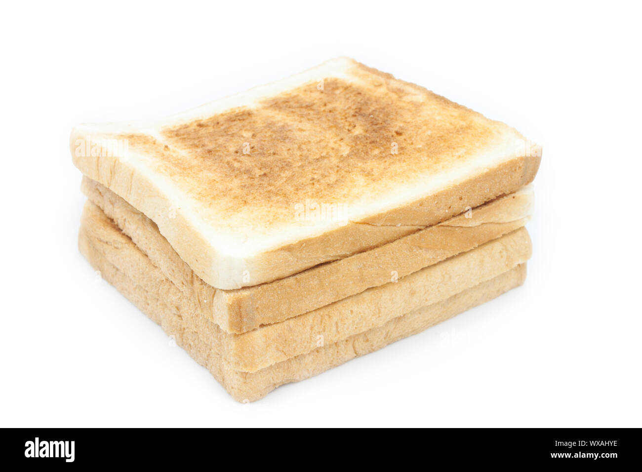 Stack of toasted bread on white background Stock Photo - Alamy