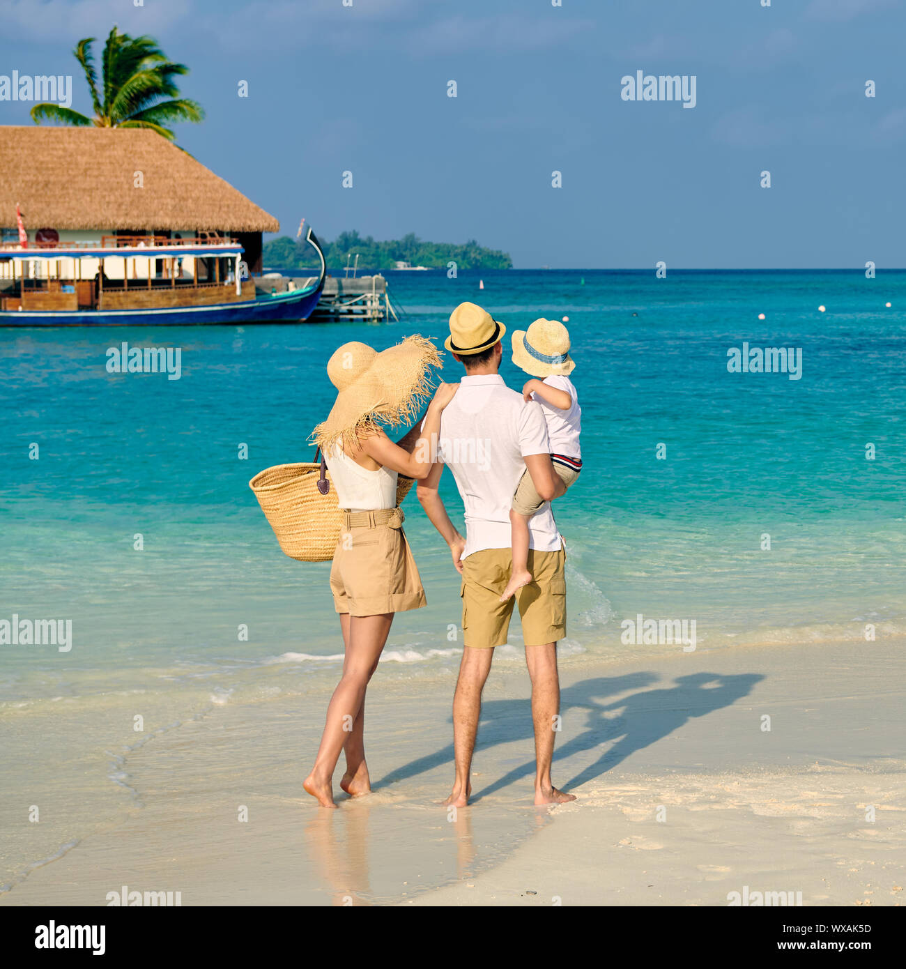 Family With Three Year Old Boy On Beach Stock Photo Alamy