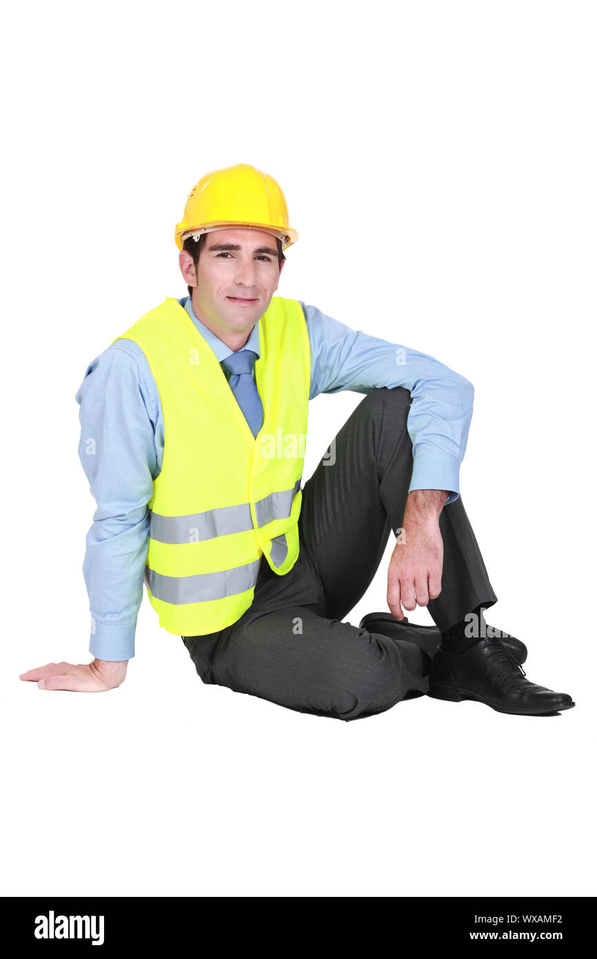 Old man sitting on the floor Stock Photo - Alamy