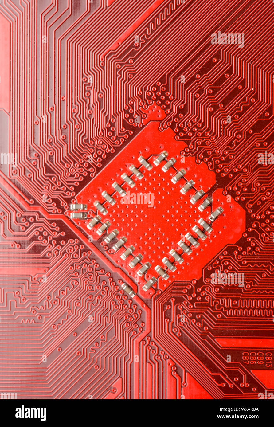 Red circuit board close-up. Electronic background Stock Photo