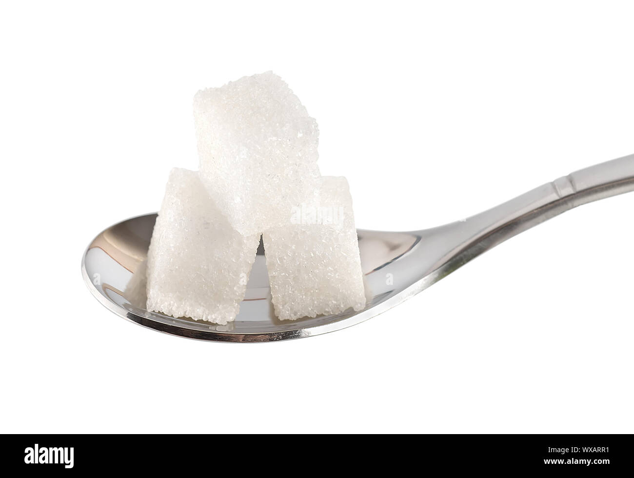 Spoon with sugar cubes isolated on a white background Stock Photo Alamy