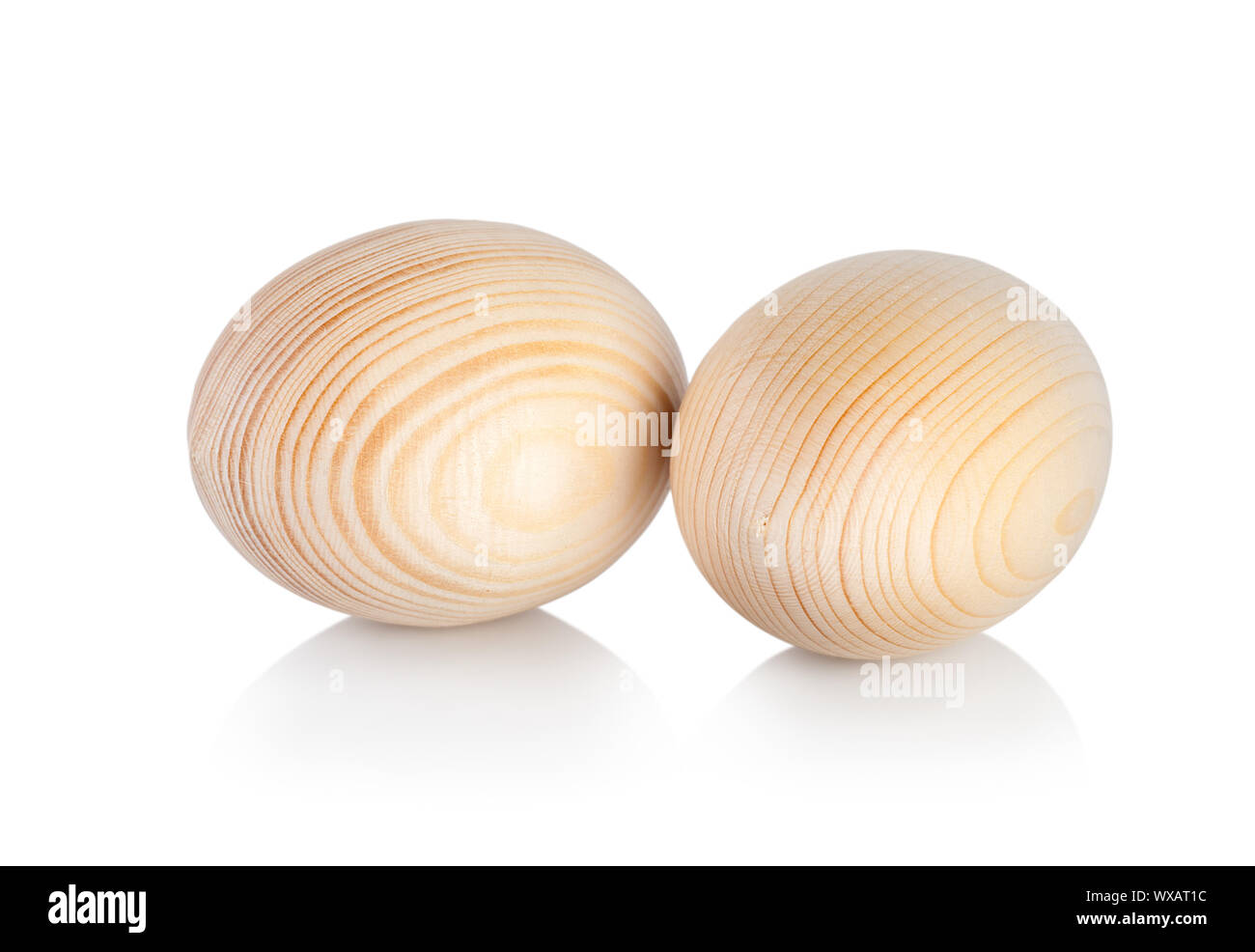 Wooden easter eggs isolated on white background Stock Photo - Alamy
