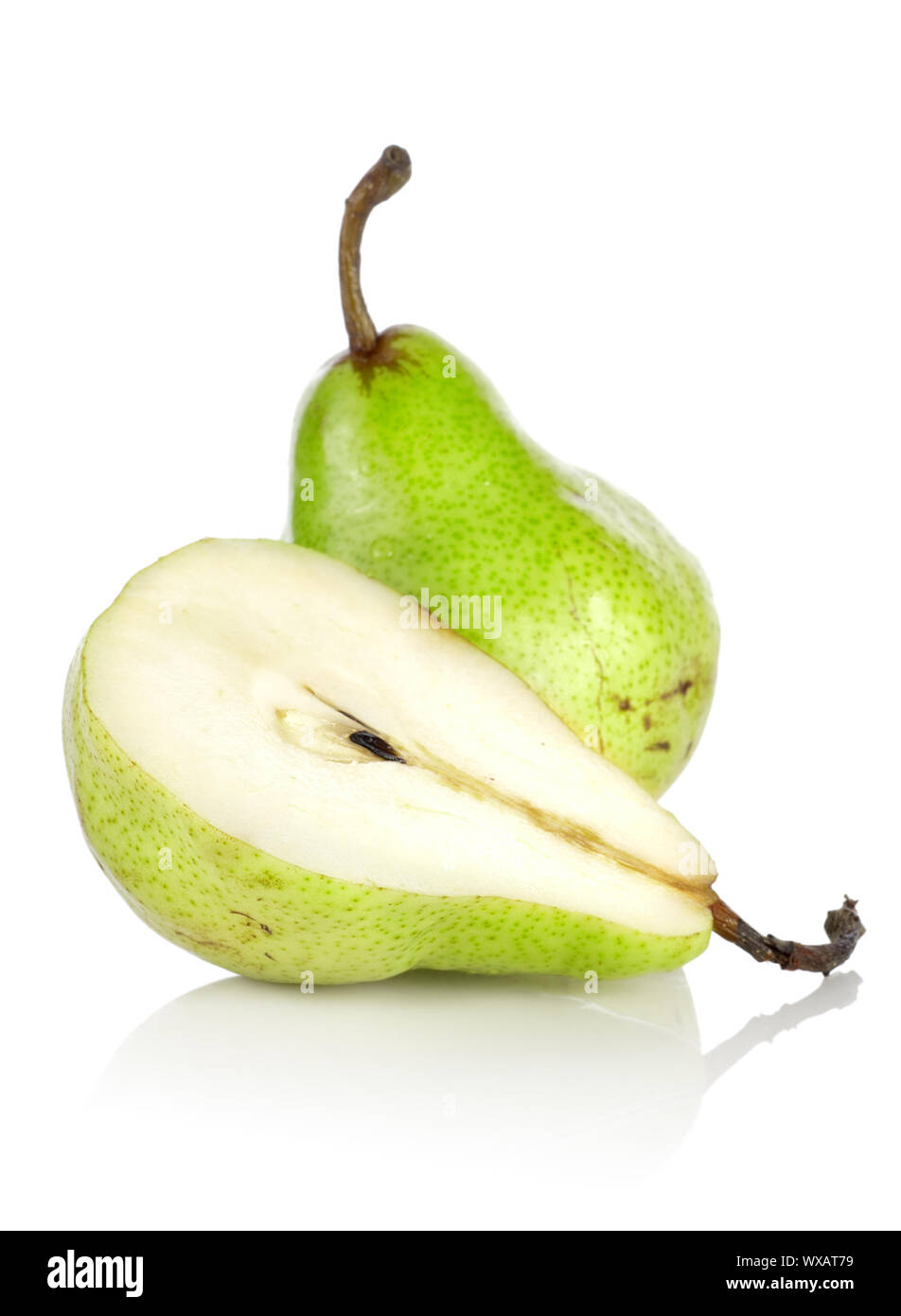 Green pears isolated on a white background Stock Photo - Alamy