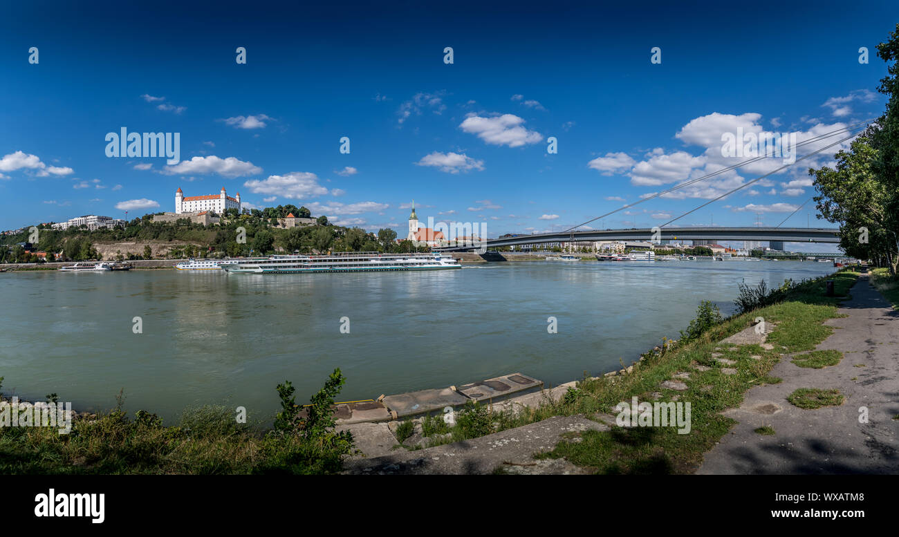 Bratislava panoramic aerial view with SNP bridge, castle, Saint Martin church and the Danube with blue sky in Slovakia Stock Photo