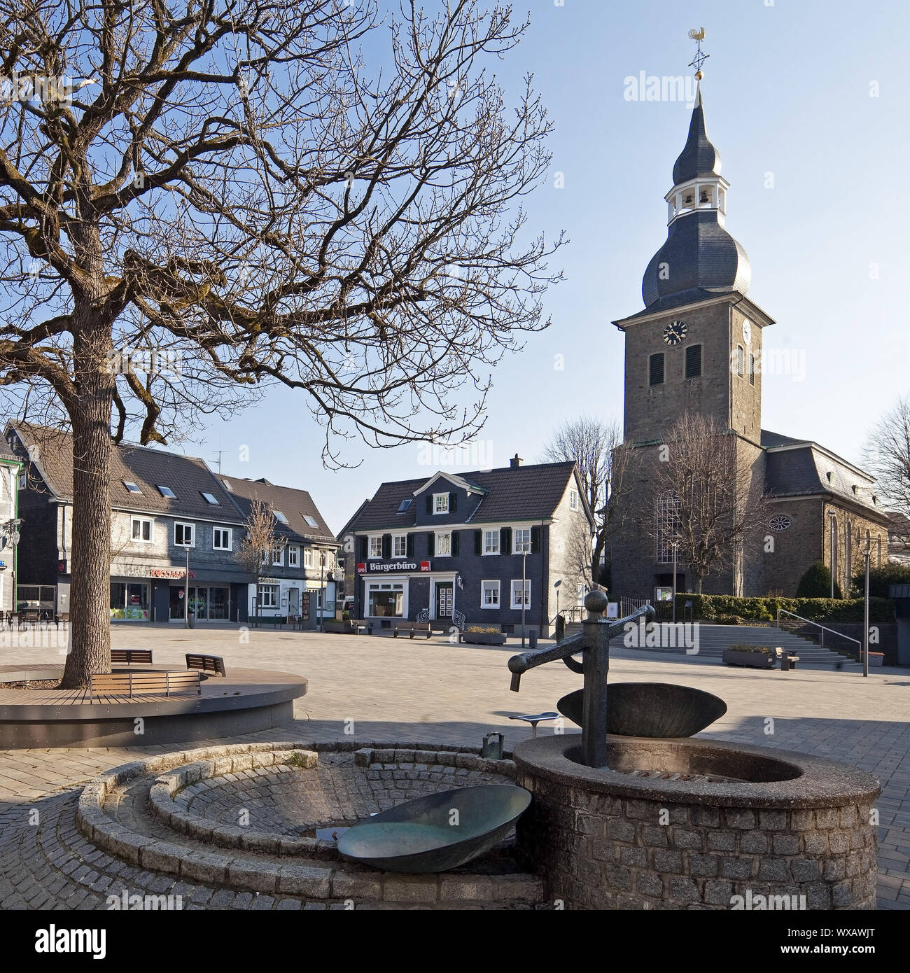 cityscape with fountain, market square and church in spring, Radevormwald, Germany, Europe Stock Photo