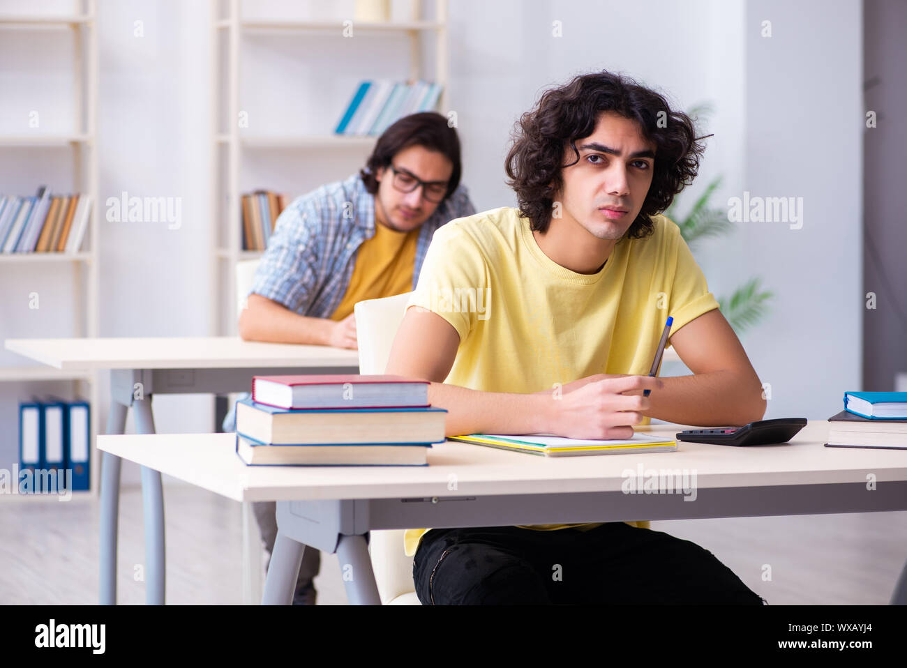 Two male students in the classroom Stock Photo