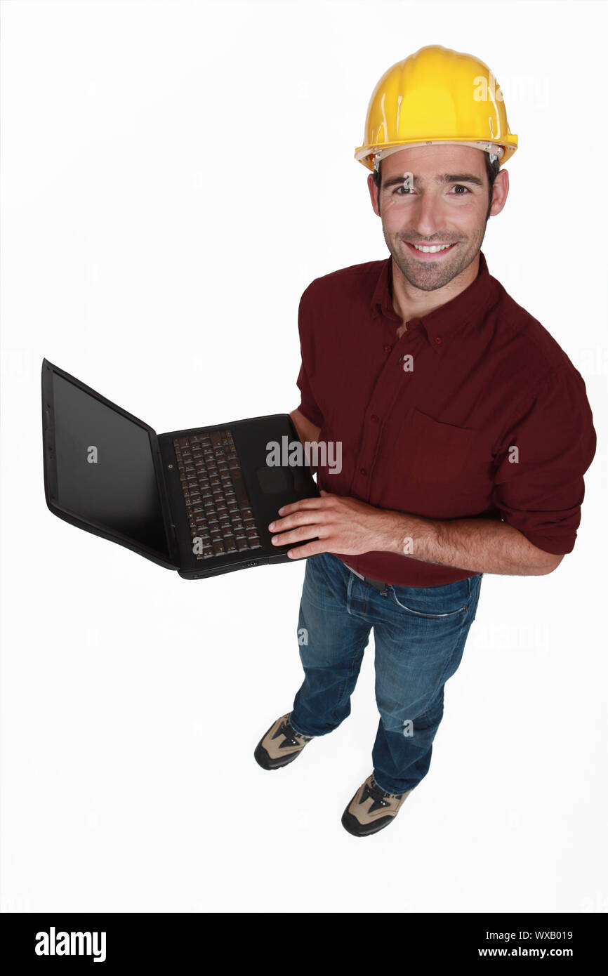 Engineer with a laptop Stock Photo