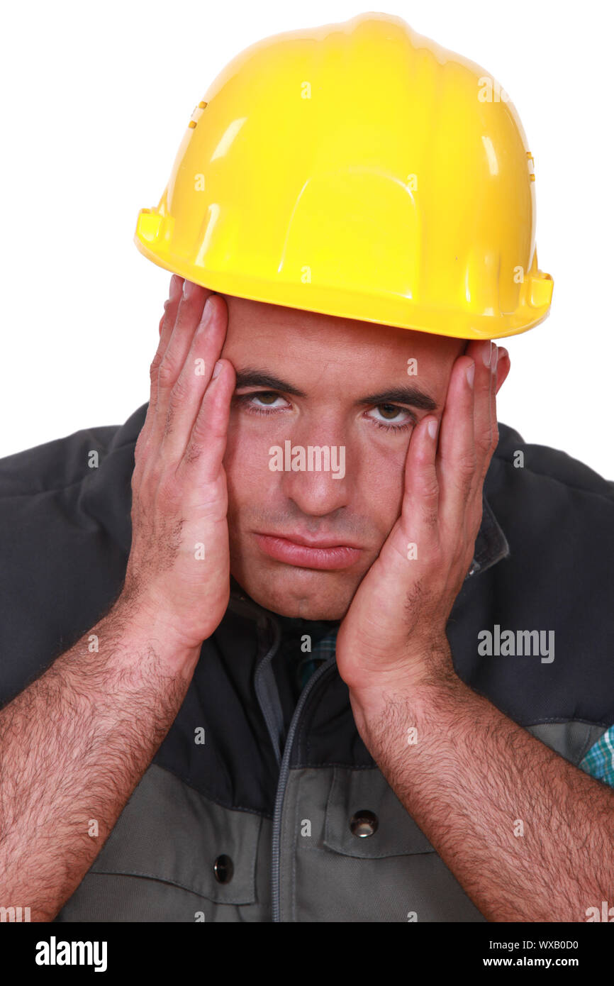 Stressed builder Stock Photo