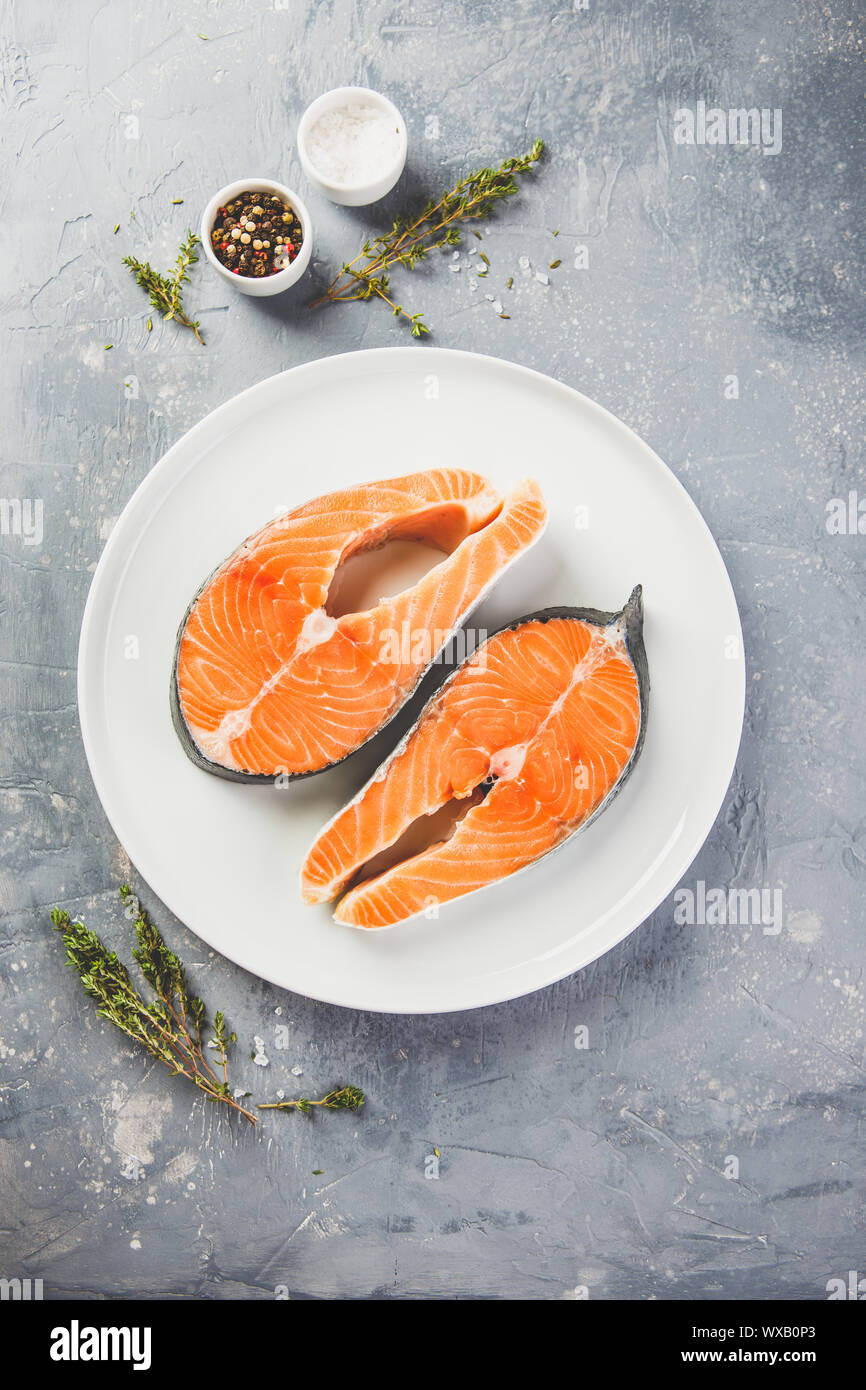 Two fresh raw salmon steaks Stock Photo - Alamy