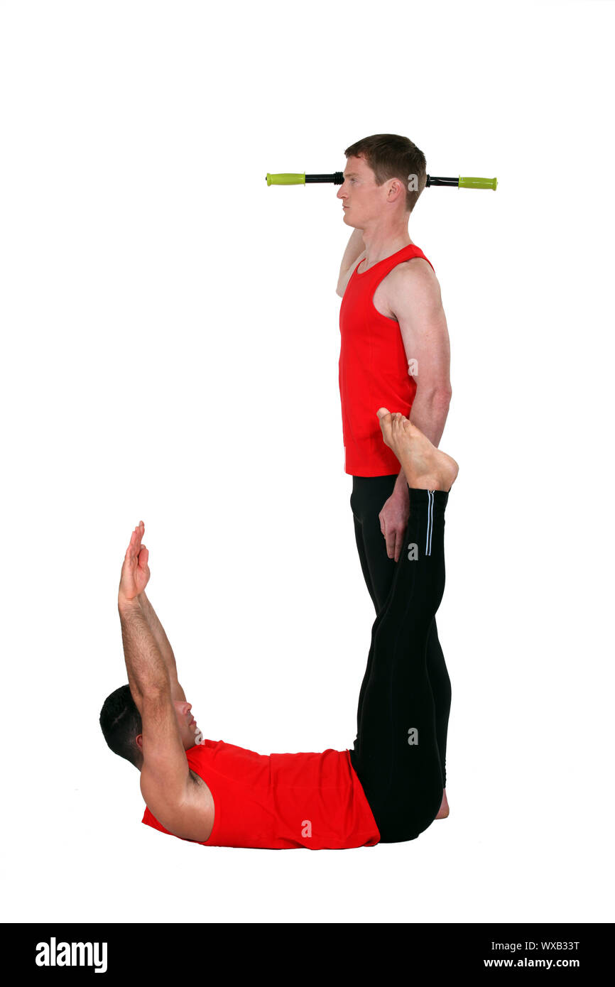 Gymnasts forming the letter J Stock Photo Alamy