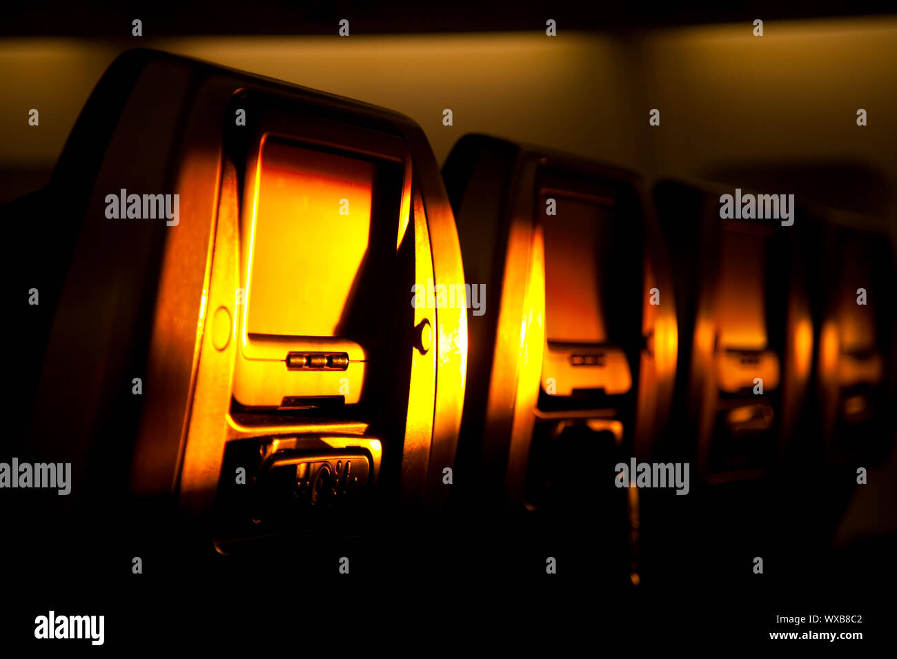 Airplane chairs lighted by sunset Stock Photo Alamy