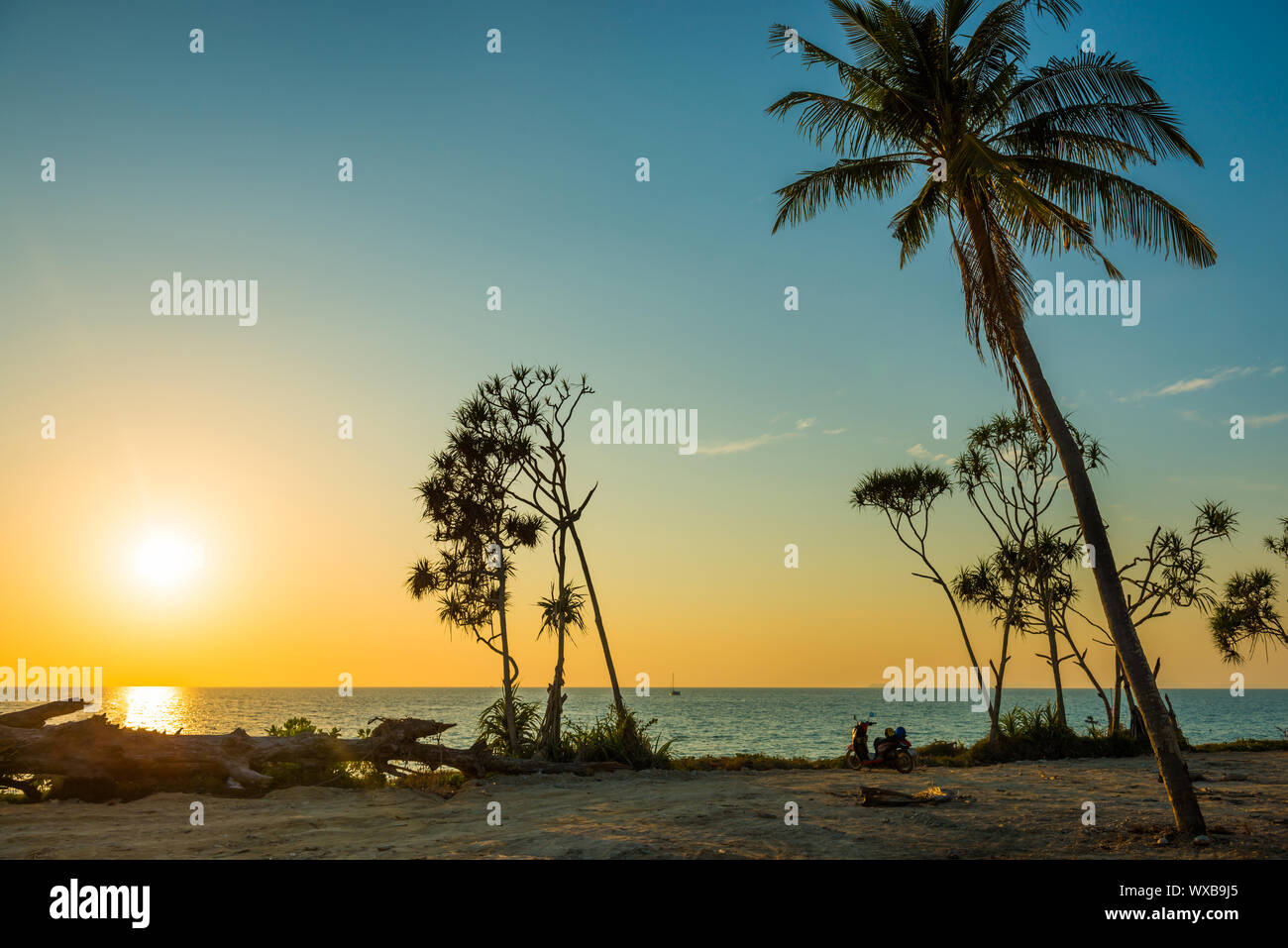 Landscape at sunset from tropical beach Stock Photo - Alamy