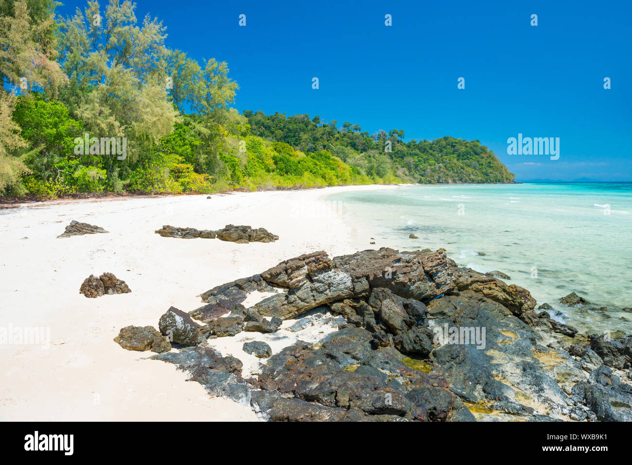 White sand beach at tropical island Stock Photo