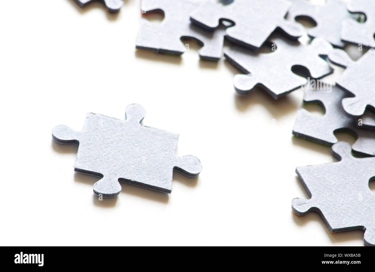 Puzzle isolated on a white background Stock Photo - Alamy
