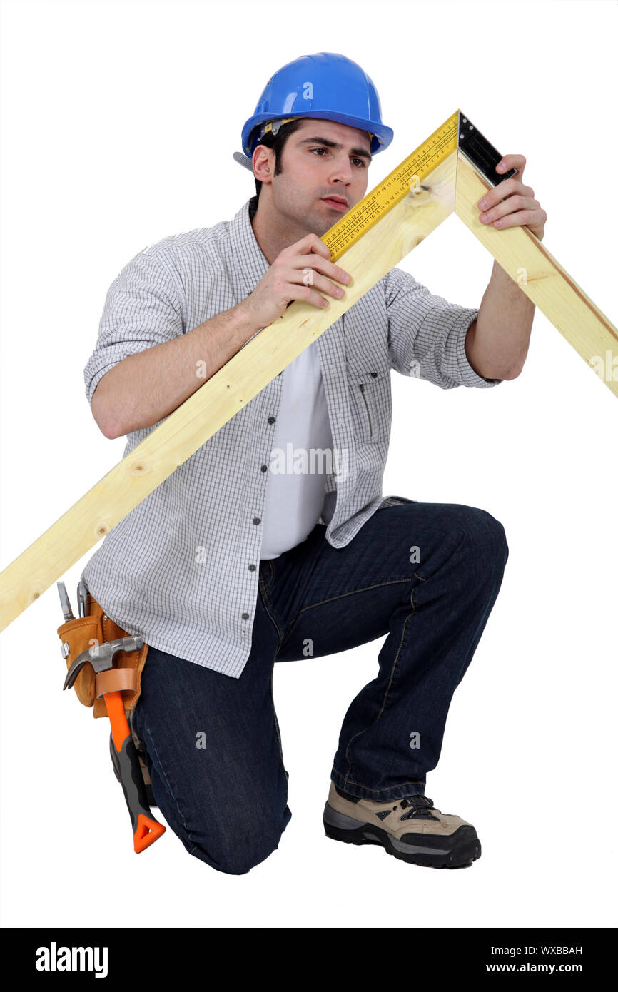 Carpenter making a frame Stock Photo Alamy