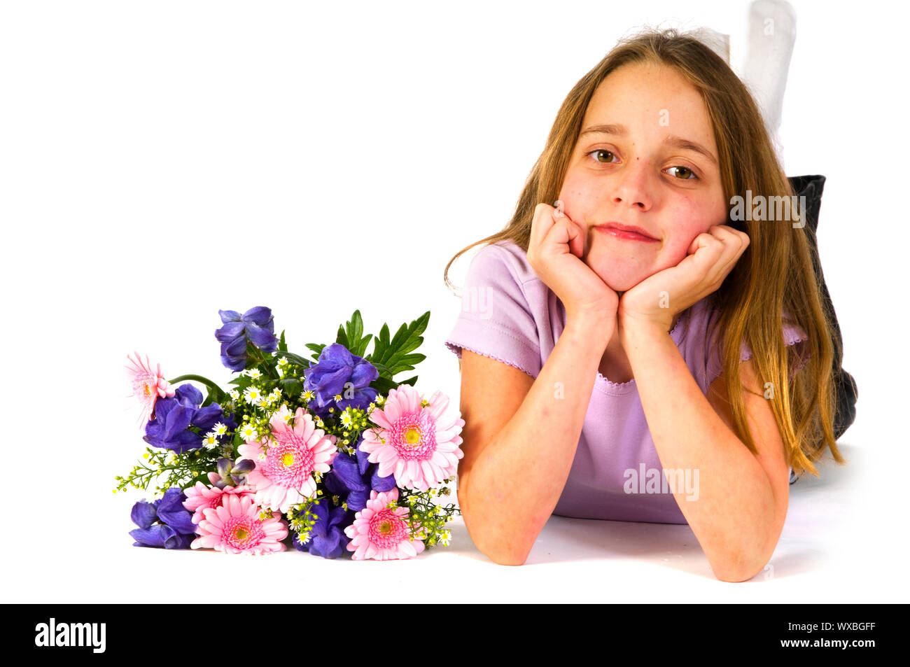 Little girl with beautiful bouquet of flowers Stock Photo - Alamy