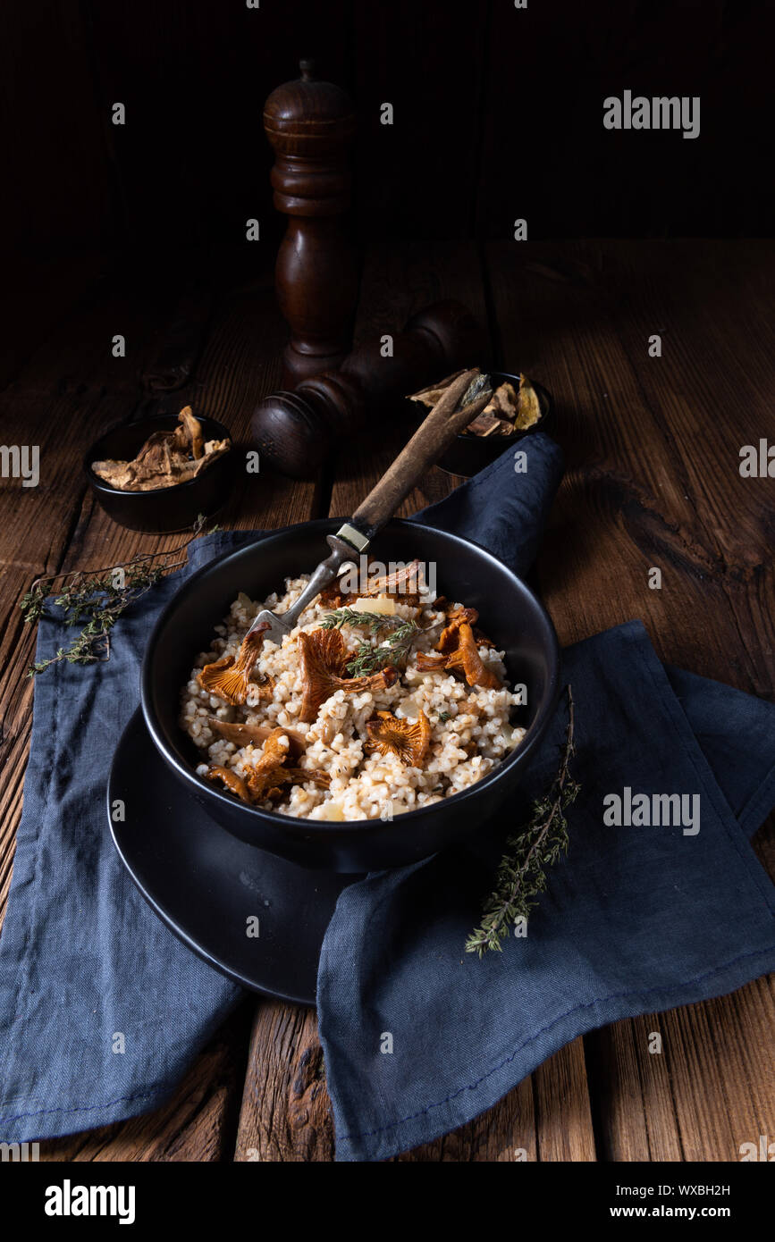 Kaszotto- polish risotto from barley groats with mushrooms Stock Photo ...