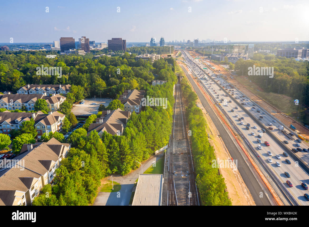 Condos in Atlanta suburbs just next to Highway GA 400 during expansion construction project Stock Photo