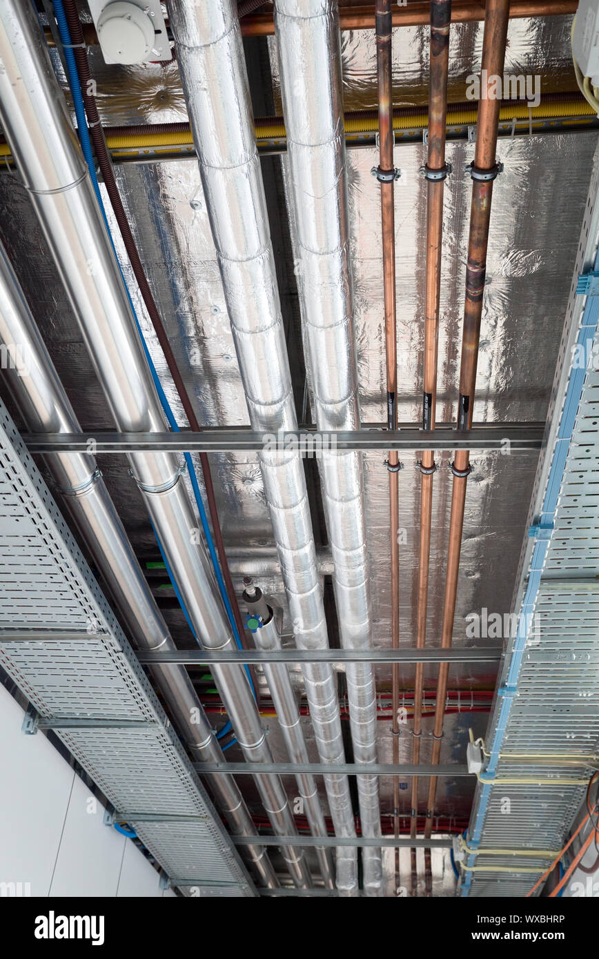 insulates hot water pipes and copper pipes hang from the subceiling