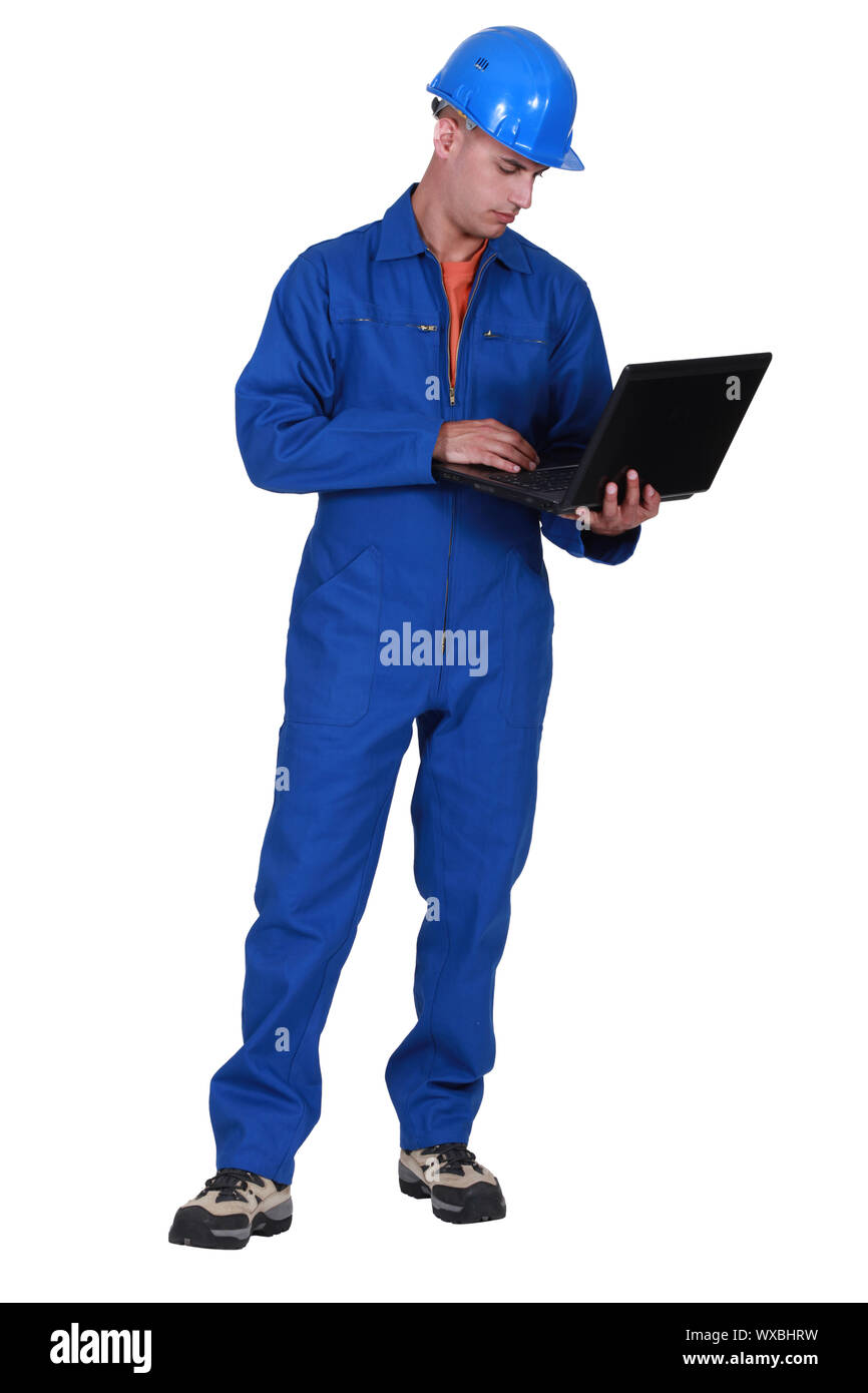 Laborer with computer Stock Photo