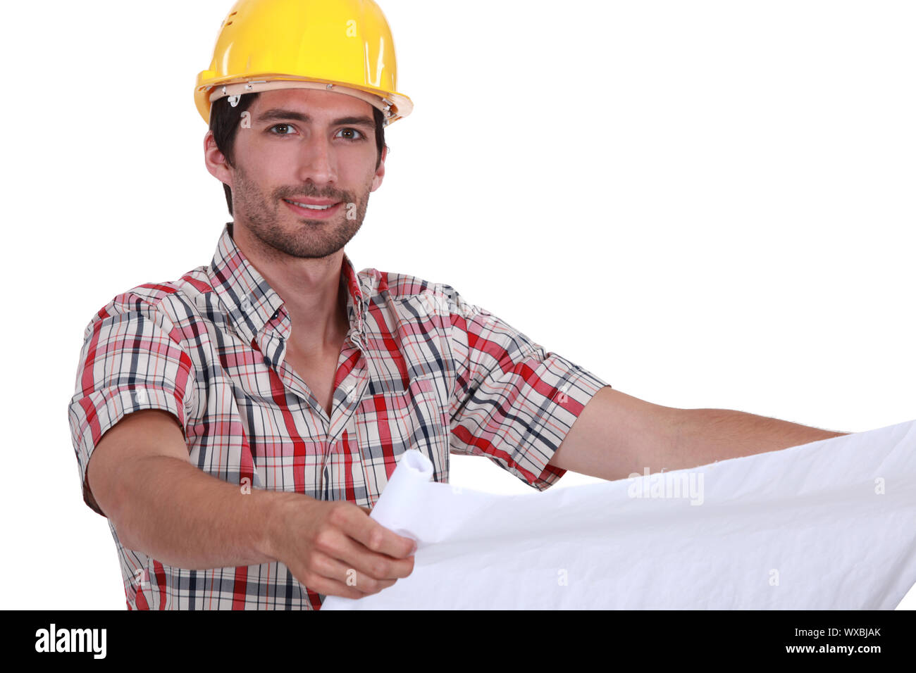 A foreman checking the plans. Stock Photo