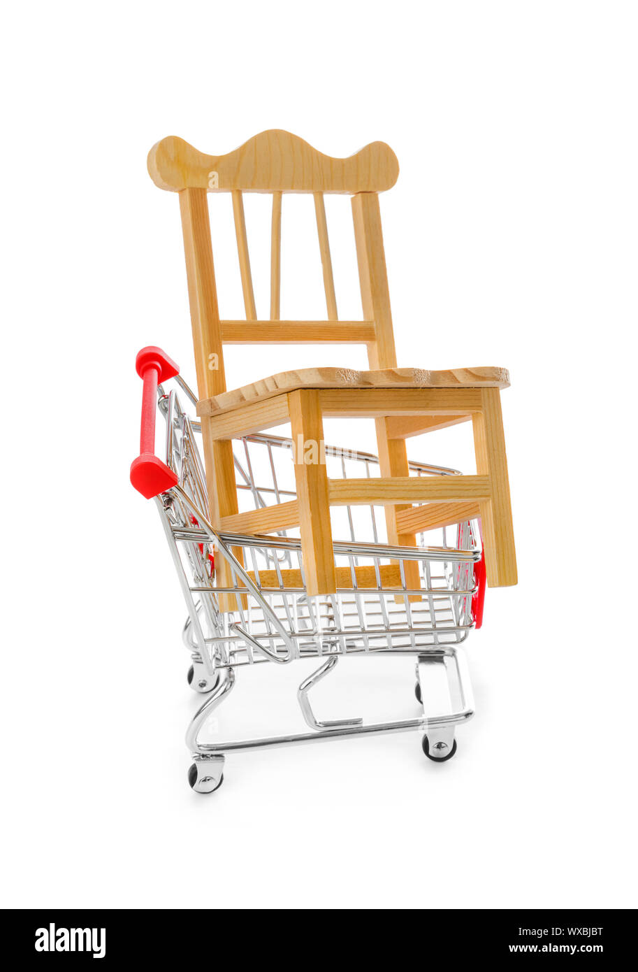 Chair in shopping cart Stock Photo Alamy