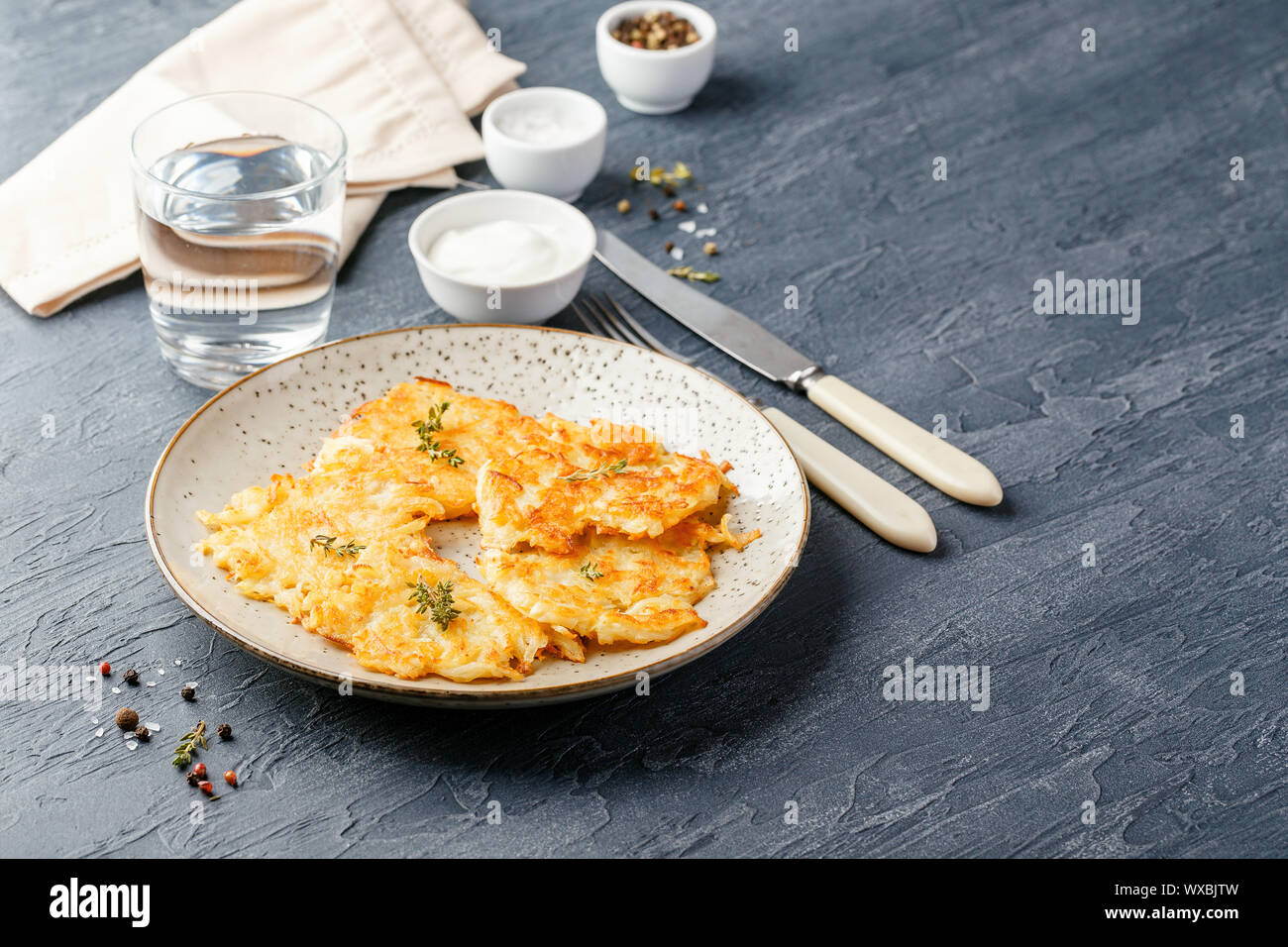 Panfried potato pancakes rosti, kartoffelpuffer, latkes, draniki