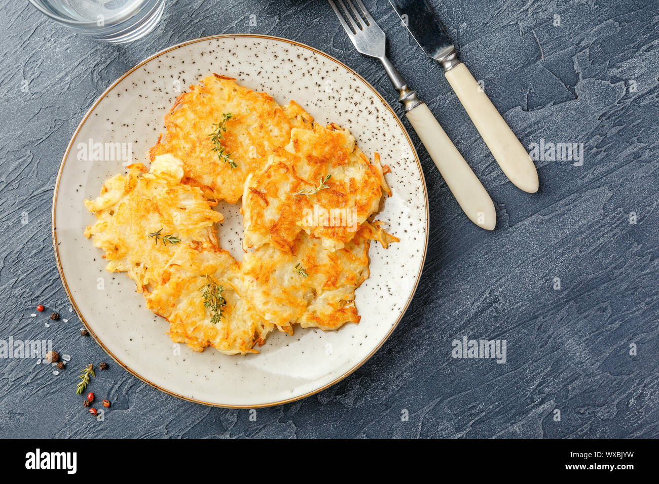 Panfried potato pancakes rosti, kartoffelpuffer, latkes, draniki