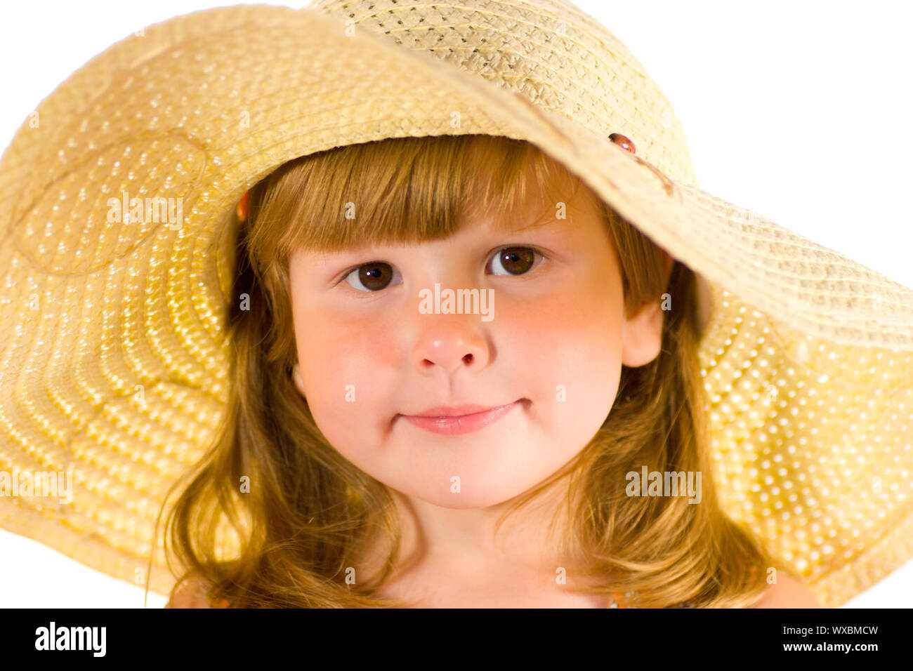 Portrait of little girl wearing straw hat Stock Photo - Alamy