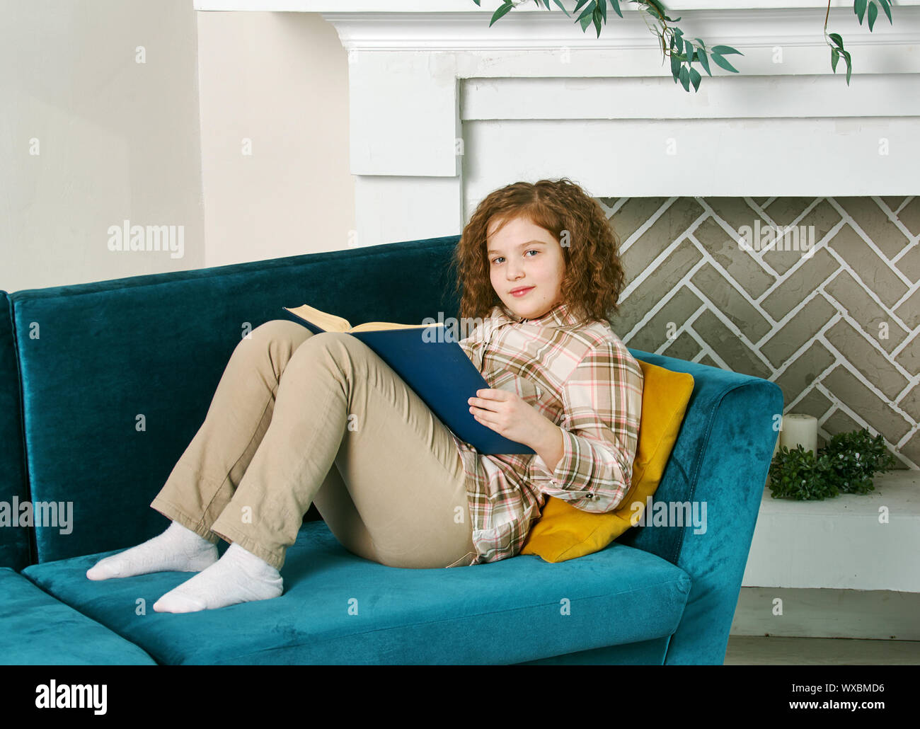 little girl reading book at home Stock Photo - Alamy