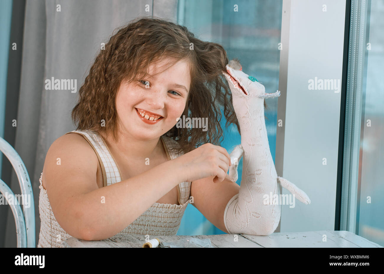 small girls with hand puppets Stock Photo