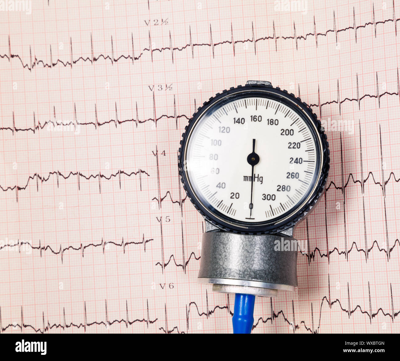 Aneroid sphygmomanometer lying on ECG diagram Stock Photo Alamy