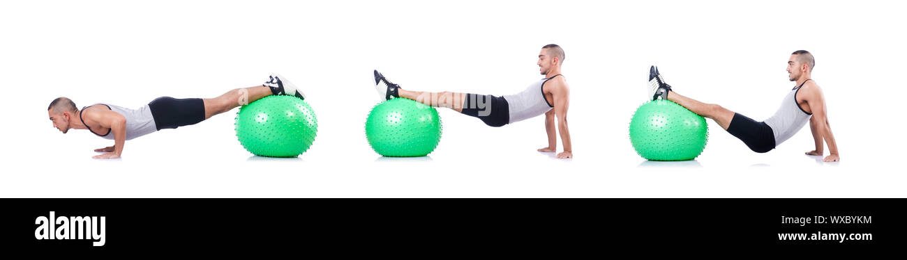 Man with swiss ball doing exercises on white Stock Photo - Alamy