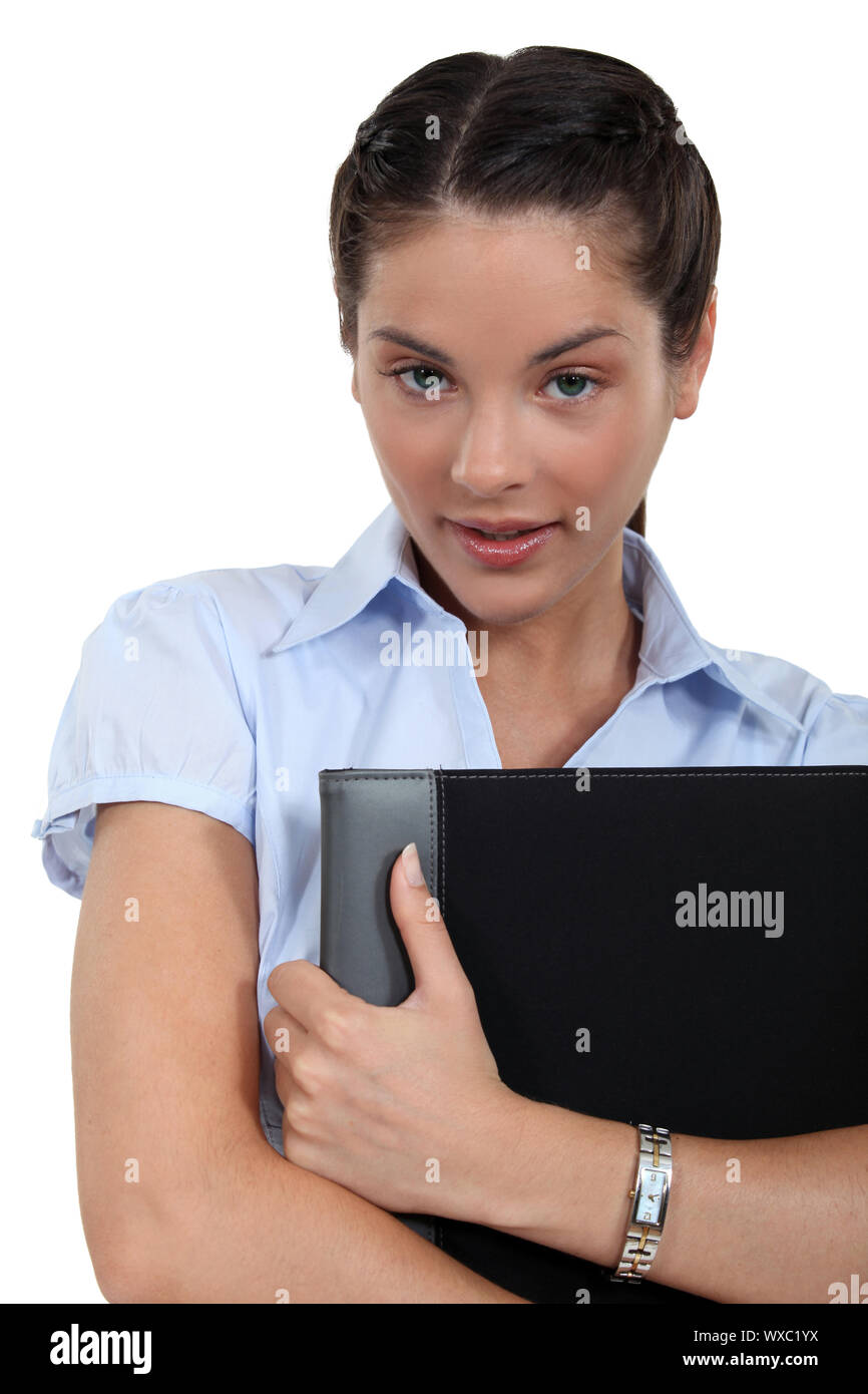 Woman holding an appointment book Stock Photo