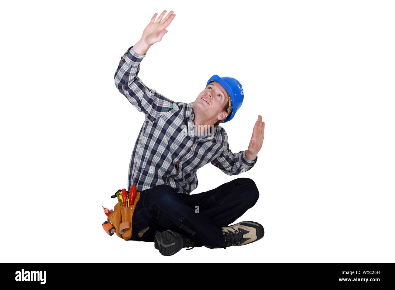 Laborer gesturing, studio shot Stock Photo