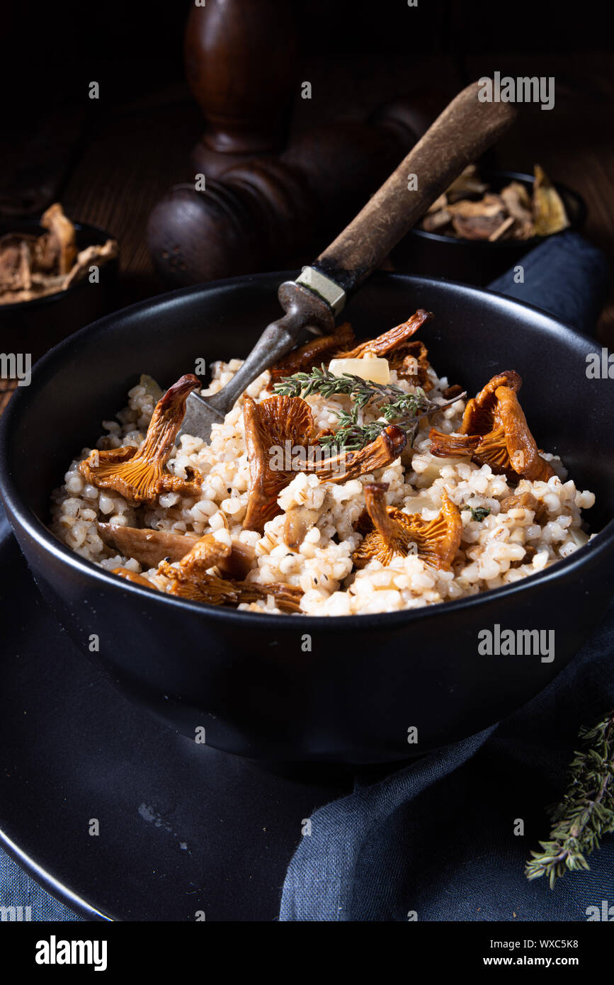 Kaszotto- polish risotto from barley groats with mushrooms Stock Photo ...