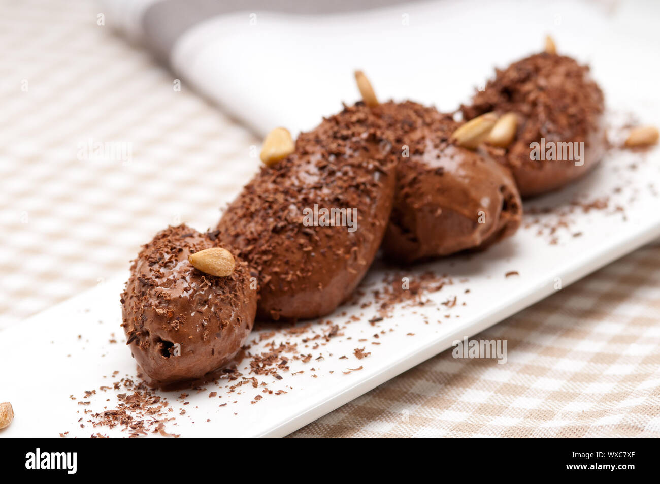 fresh home made chocolate mousse quenelle dessert Stock Photo Alamy