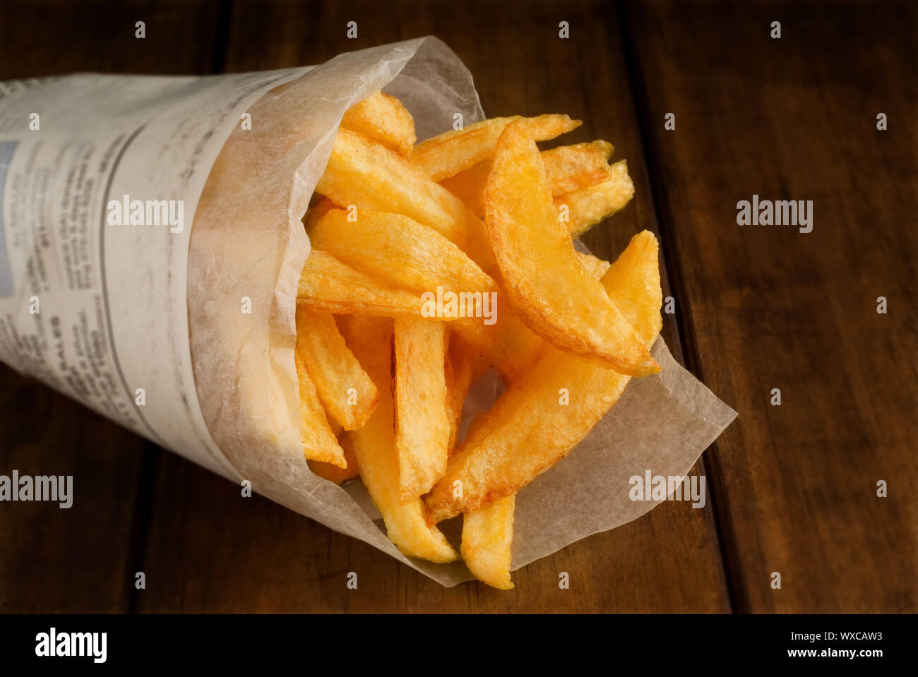 French fries in paper box to go Stock Photo - Alamy