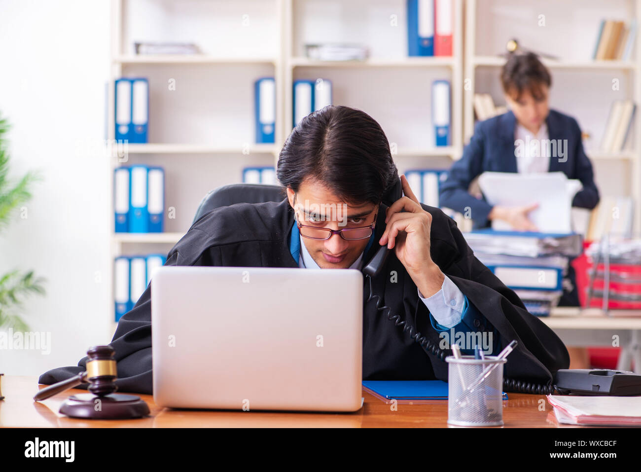 Two lawyers working in the office Stock Photo Alamy